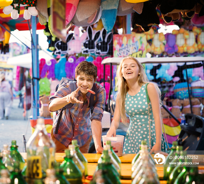 Teenagers (14-15, 16-17) in amusement park