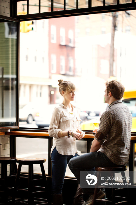 Young people on date in cafe