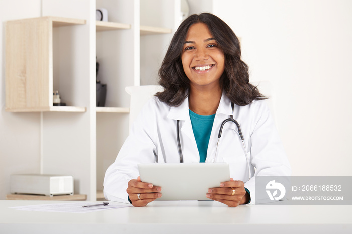 female doctor working in her studio