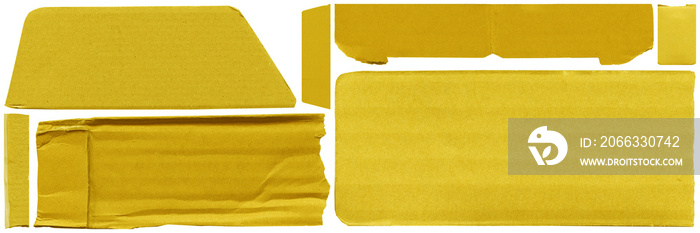 Close up of a yellow vintage torn sheet of carton. Cardboard paper texture with a blank background. Empty papercraft surface. Isolated shape and element.