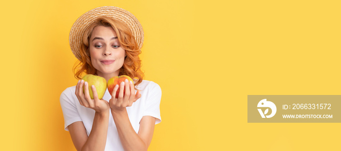 Summer girl hold apple. Beauty woman isolated face portrait, banner with mock up copy space. hungry girl with apple fruit. vitamin and dieting. woman in straw hat eating healthy food.