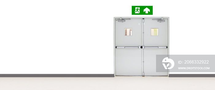 Green emergency fire exit sign or fire escape with the doorway or door exit in the building concepts for evacuation in the event of a fire.