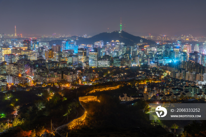 Namsan tower viewed behind an ancient wall at Inwangsan mountain in Seoul, Republic of Korea