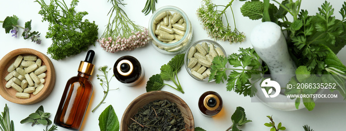 Concept of herbal medicine pills on white background, top view