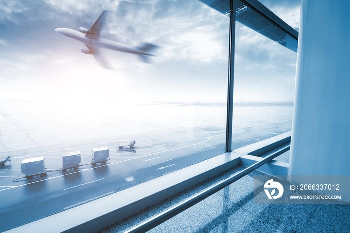 modern airport scene of passenger motion blur with window outside.