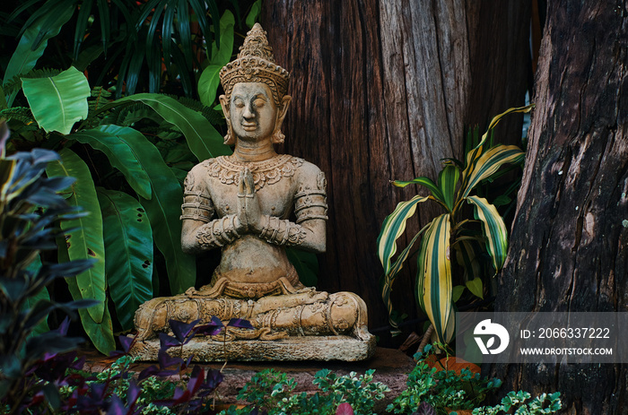 The statue of asian angel decorated in the garden