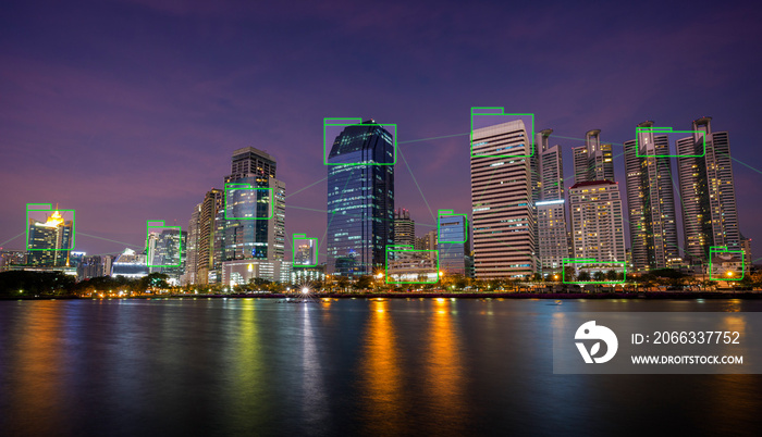 Cityscape of digitally connected skyscrapers in Bangkok, Thailand at dusk. Technology, network connection, information and smart city concept. Digital elements.