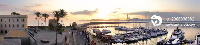 Alghero, Italy - Panoramic view of the Alghero historic quarter and marina with St. Elm Tower