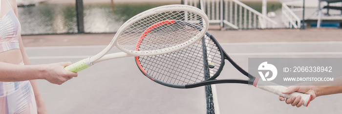 Racquet tap, greeting or finishing tennis game post covid 19 coronavirus pandemic, new normal sport concept