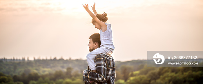 father and daughter at sunset, family values