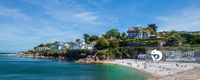 Brixham Devon, UK, Europe. Beautiful seaside panorama. Landscape by the sea on a sunny day. View of the rocks