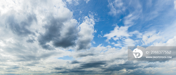 blue sky background with white clouds cumulus floating soft focus, copy space