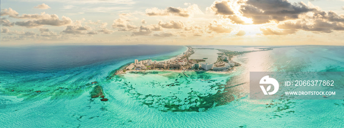 Aerial 360 panoramic view of Cancun beach and city hotel zone in Mexico at sunset. Caribbean coast landscape of Mexican resort with beach Playa Caracol and Kukulcan road