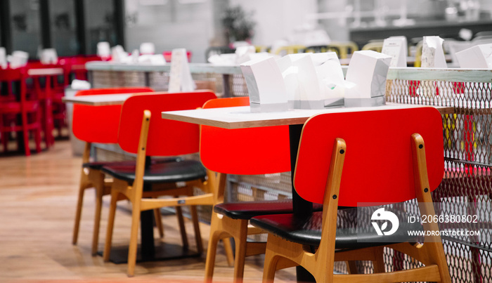 Cafeteria or canteen interior. School cafeteria. Factory canteen with chairs and tables, nobody. Mod