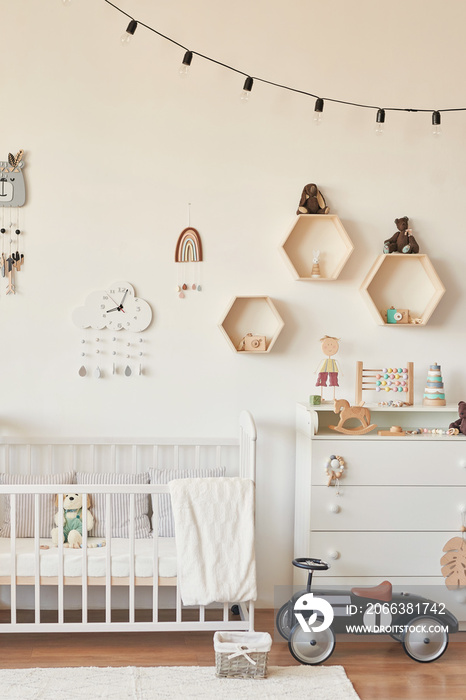 wooden toys in the childrens room, chest of drawers and a white bed, the interior of the childrens