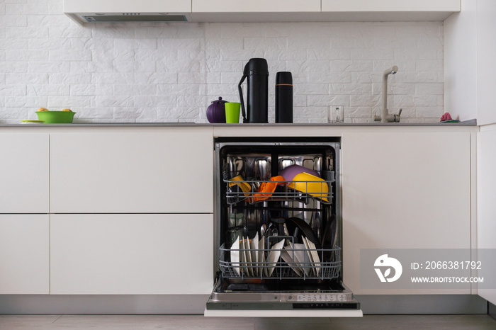 Modern dishwasher open, technology, kitchen.