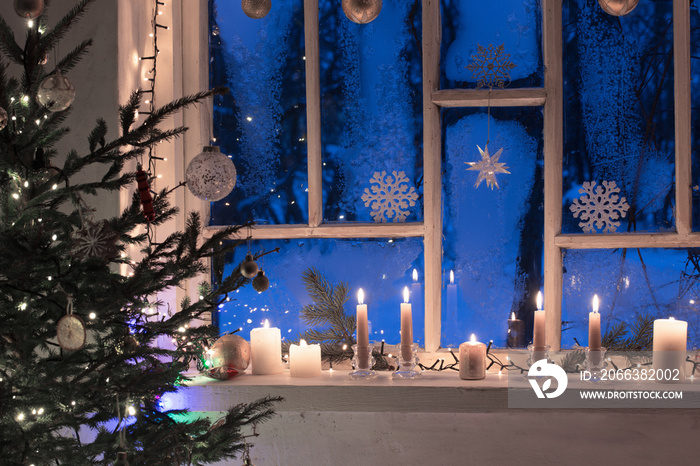 Christmas decorations on old wooden window