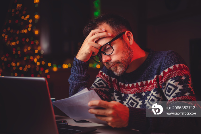 Worried Men cheeking his mail late night