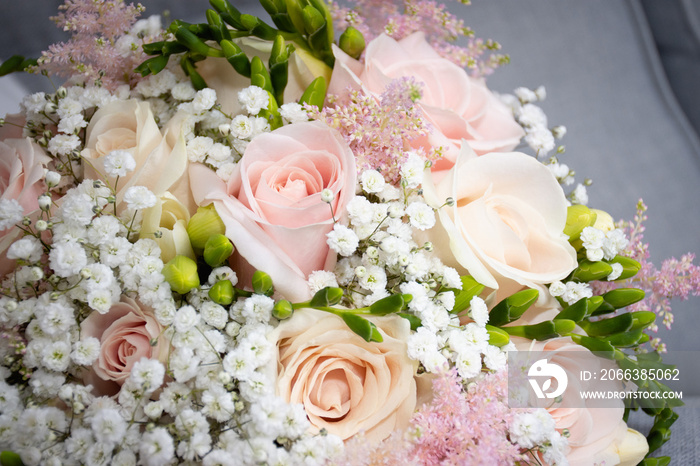 Wedding flower bouquet of yellow and pink roses