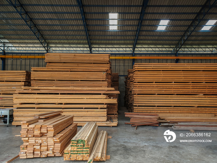Lumber - Wood factory stock or timber in warehouse. ,Piles of wooden boards  waiting for shipping. L
