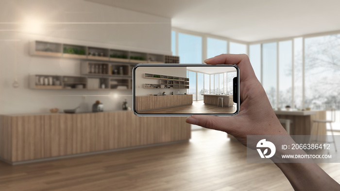 Hand holding smart phone, AR application, simulate furniture and interior design products in real ho