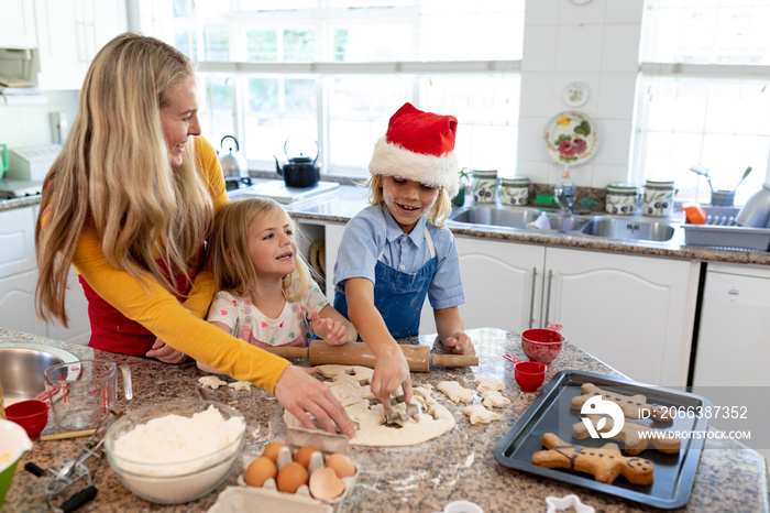 Family making Christmas cookies at home