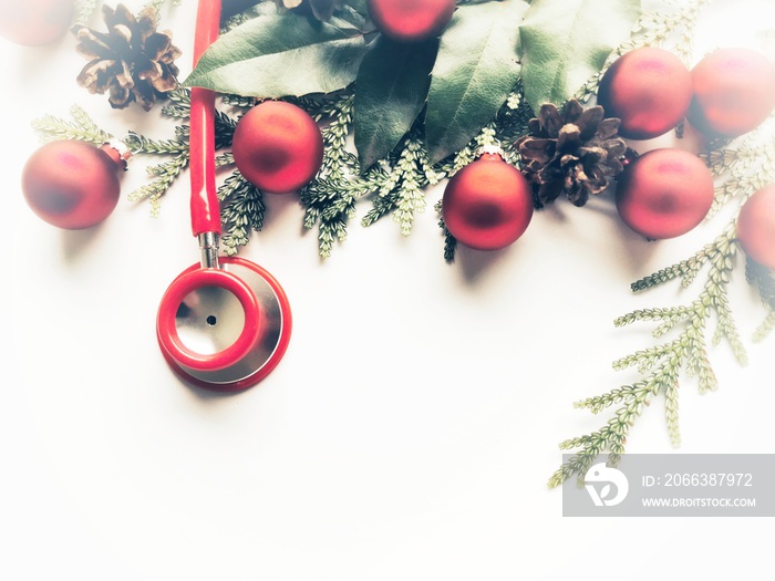 Stethoscope and Christmas decorations. Greeting card. New Year and Christmas.