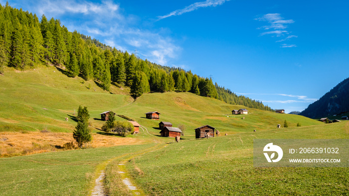 Pfundser Tschey is one of the most beautiful high valleys of Tyrol (Austria). The panorama with hay barns and the Maria Schnee chapel is gorgeous. Tschey means high valley in Rhaeo-Romanic.