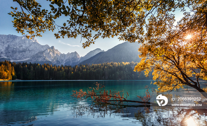 Impressively beautiful Fairy-tale mountain lake in Alps. Wonderful view of beautiful mountain landscape with calm lake Fusine.