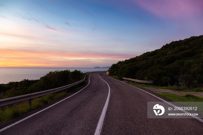 Scenic Highway on the Sea Coast during Sunny Fall Season Sunset. Sardinia, Italy. Adventure Travel