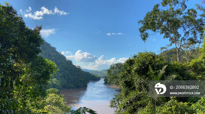 Panorama over river in amazon basin showing pristine rainforest in Peru