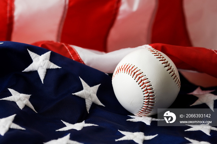 Baseball: Baseball Sitting on American Flag