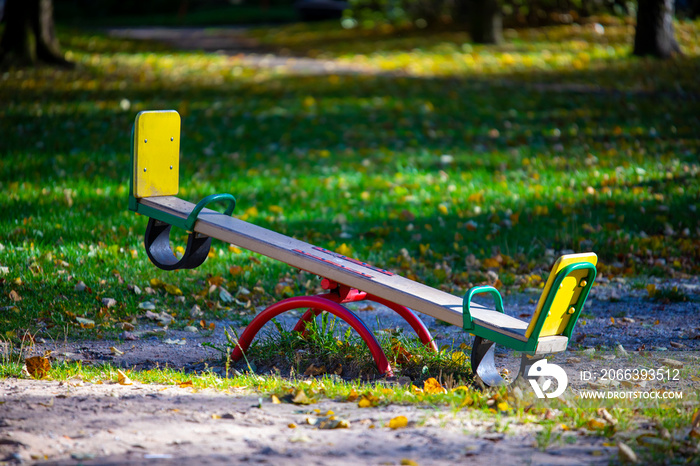 Empty swings in a childrens playground