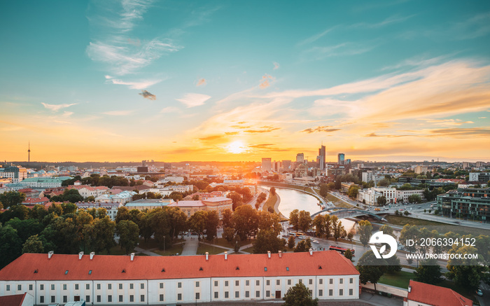 Vilnius, Lithuania. Sunset Sunrise Dawn Over Cityscape In Evening Summer. Beautiful View Of Modern Office Buildings Skyscrapers In Business District New City Centre Shnipishkes