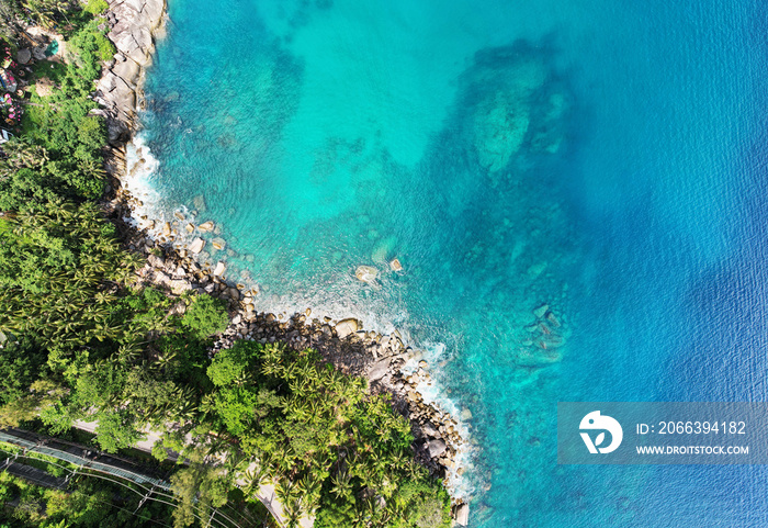 Aerial view of curve road along the seashore at Phuket Thailand, Beautiful seacoast and open sea in summer season,Nature recovered Environment and Travel background