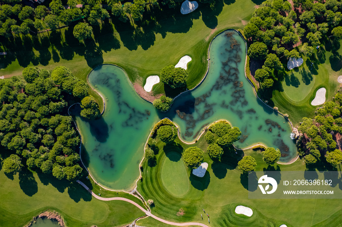 Luxury Green golf course field with lake Antalya Belek Turkey, aerial top view