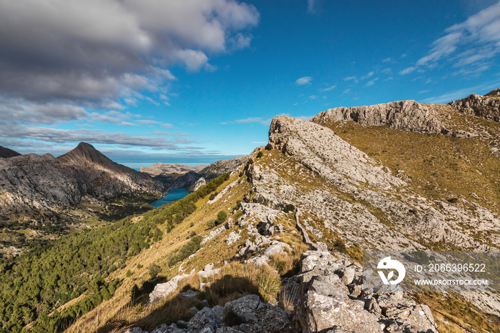 Serra de Tramuntana mountains scenery with views over the “Gorg Blau” water reservoir and some beautiful peaks. Located in the island of Majorca, Spain.