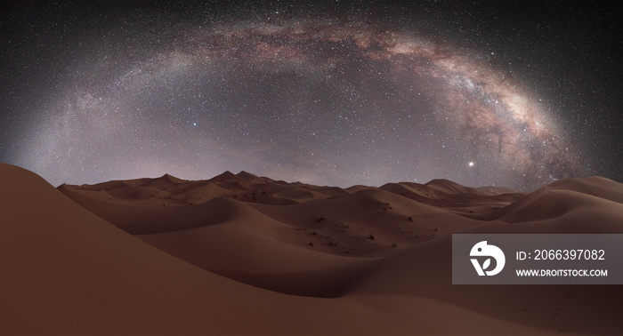 Amazing milky way galaxy over the sand dunes of Sahara Desert - Sahara, Morocco