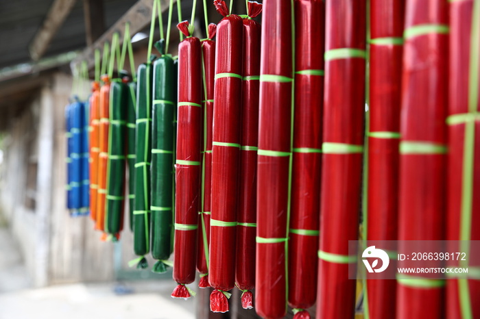 filipino traditional stick sweets wrapped with colorful covers in lanao del sur, mindanao island