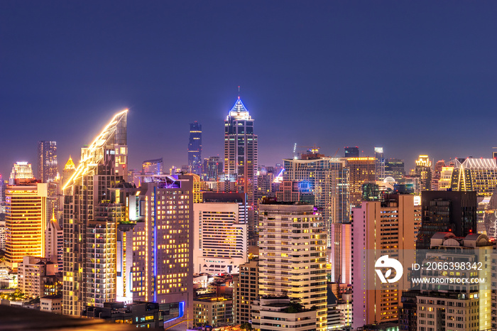 night urban cityscape building with lighting and clear sky