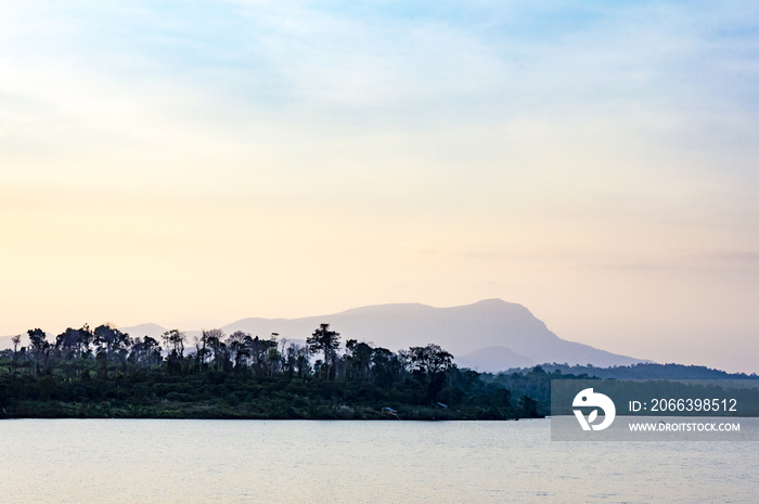 Beautiful lake and mountain on the background at the sunset time landscape in Cardamom Mountains, Cambodia