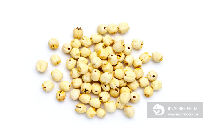 Dried lotus seeds on white background.