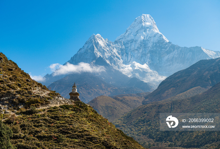 Buddhist stupa at the edge of the mountain with beautiful view of Mt.Ama Dablam