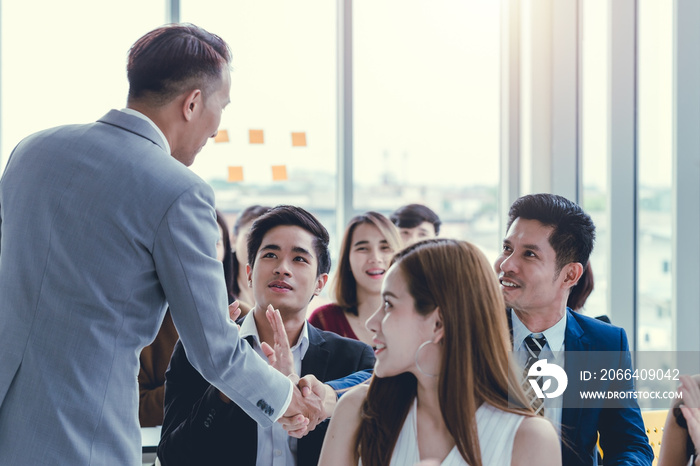 Asian Business men trainer giving presentation