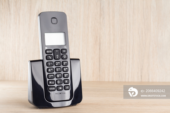 wireless telephone on wooden background