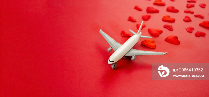 Valentines card, beautiful red background with airplanes. Selective focus.