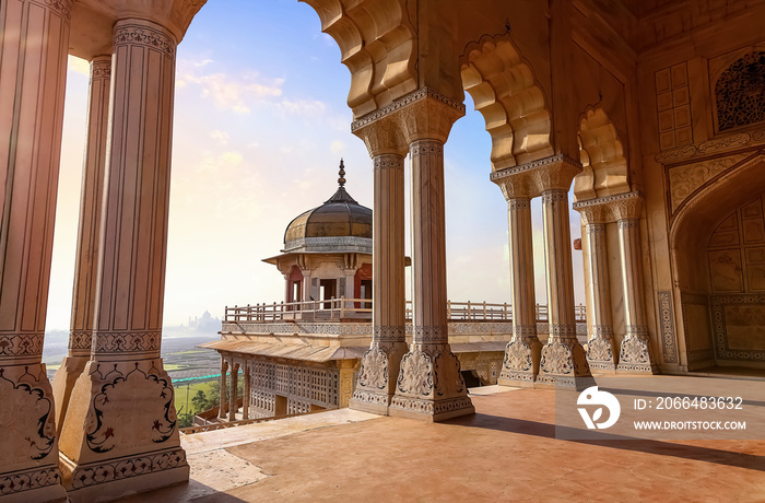 Agra Fort Musamman Burj dome as seen through the pillars of a hallway known as the Diwan-i-Khas. Agr