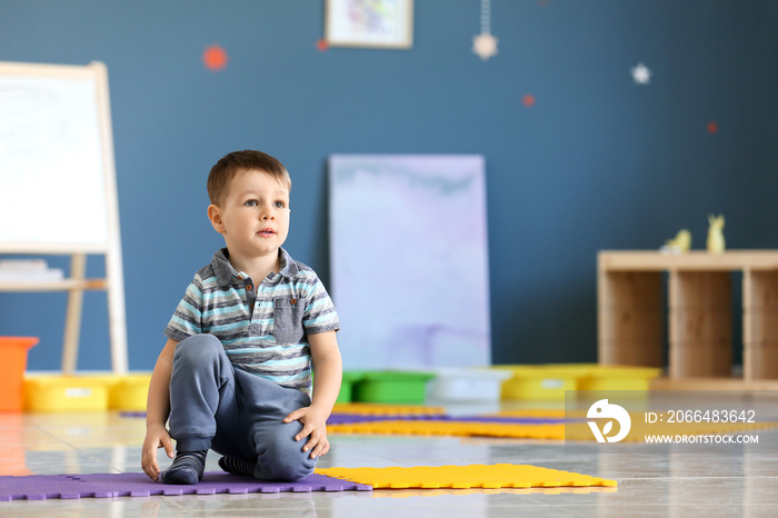 Little boy with autistic disorder in playroom