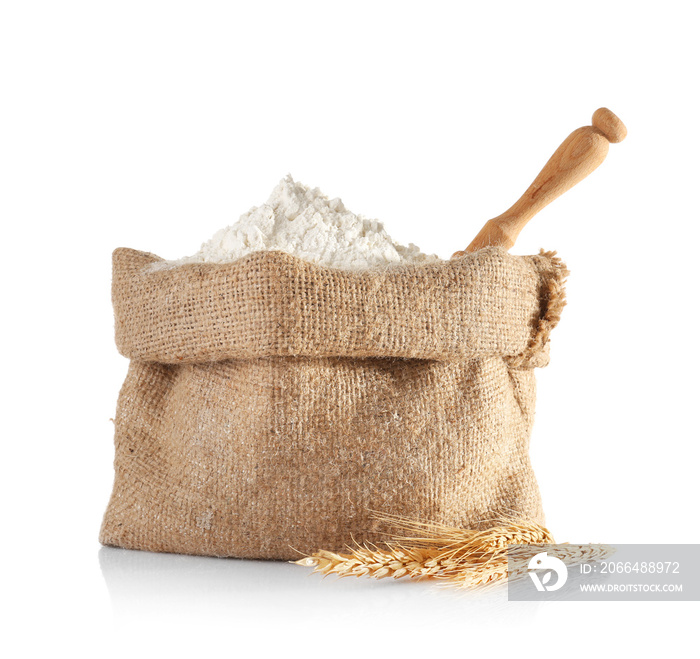 Bag with flour on white background