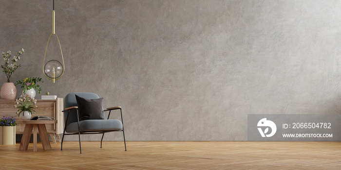 The interior has an armchair on empty concrete wall background.